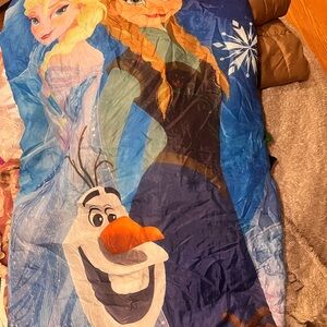 Frozen sleeping bag and accompanying nap sack to carry it in.